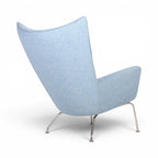 Rearview of CH445 Lounge Chair Replica in light blue fabric | Modern Approach