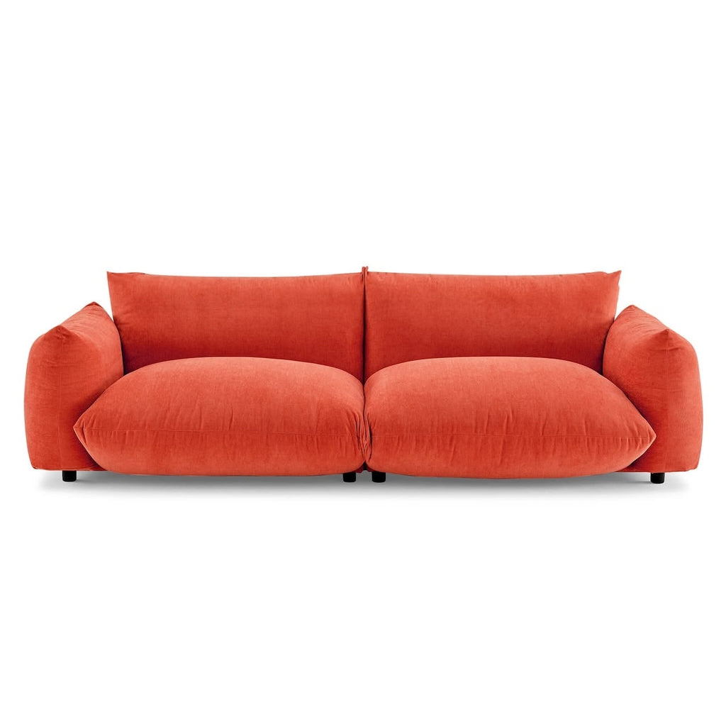 Two seater sofa in coral colour fabric 